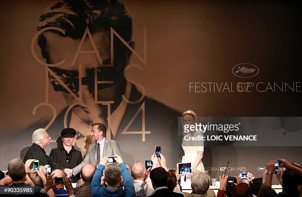Australian actress Nicole Kidman , British actor Tim Roth and French director Olivier Dahan arrive to hold a press conference for the film "Grace of...