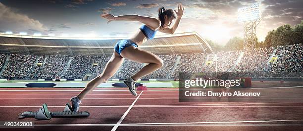 female athlete sprinting - sprint arena stock pictures, royalty-free photos & images