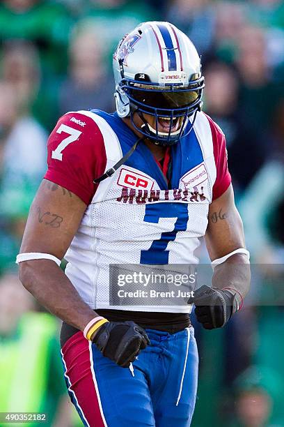 John Bowman of the Montreal Alouettes celebrates after a sack in the game between the Montreal Alouettes and Saskatchewan Roughriders in week 14 of...