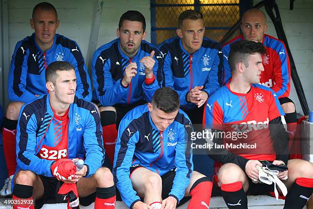 Rangers substitutes look on from the dug out during the Scottish Championships match between Greenock Morton FC and Rangers at Cappielow Park on...