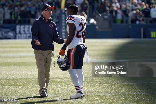 Head coach John Fox of the Chicago Bears has some words with strong safety Antrel Rolle of the Chicago Bears during the third quarter of the game...