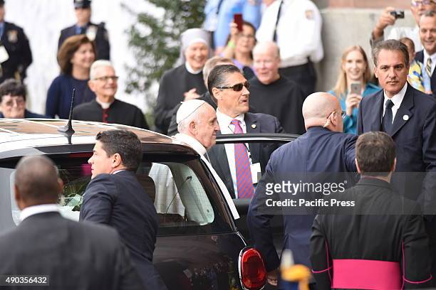 Pope emerges from Fiat at the steps of the Cathedral Basilica of Peter and Paul. Pope Francis arrived at the Cathedral Basilica of Peter and Paul in...