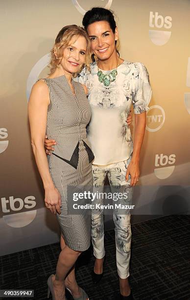 Kyra Sedgwick and Angie Harmon attend the TBS / TNT Upfront 2014 at The Theater at Madison Square Garden on May 14, 2014 in New York City....