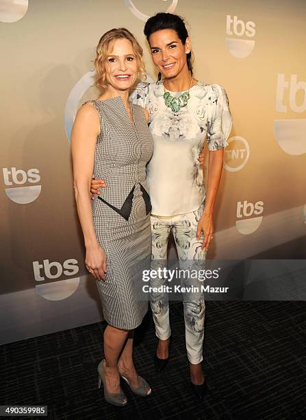 Kyra Sedgwick and Angie Harmon attend the TBS / TNT Upfront 2014 at The Theater at Madison Square Garden on May 14, 2014 in New York City....