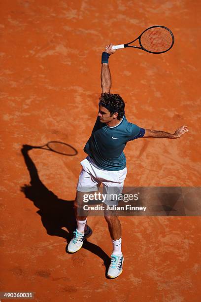 Roger Federer of Switzerland plays a backhand in his match against Jeremy Chardy of France during day four of the Internazionali BNL d'Italia tennis...