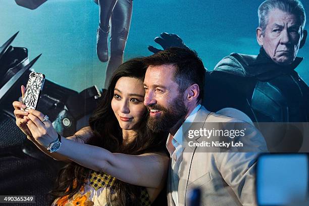 Actor Hugh Jackman and actress Fan Bingbing attend the "X-MEN: Days of Future Past" Southeast Asia Premiere on May 14, 2014 in Singapore.