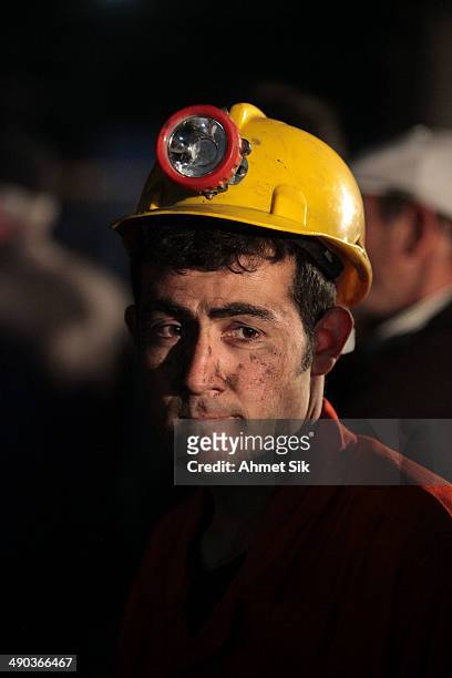 Miner awaits trapped friends on May 14, 2014 in Soma, Turkey. Rescuers pulled more dead and injured from the coal mine in western Turkey on Wednesday...