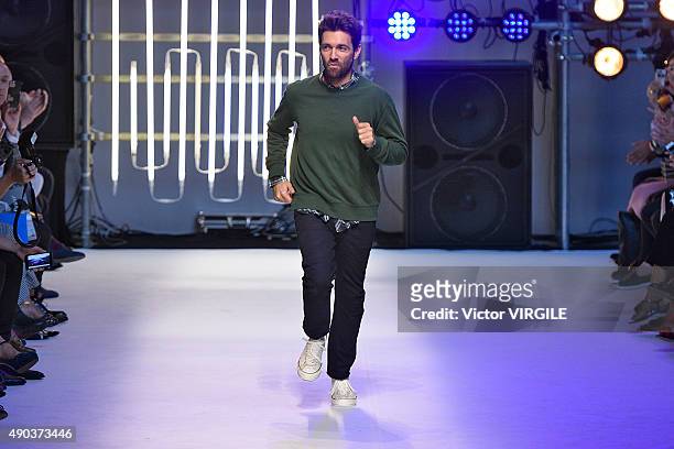 Fashion designer Massimo Giorgetti walks the runway during the MSGM fashion show as part of Milan Fashion Week Spring/Summer 2016 on September 27,...
