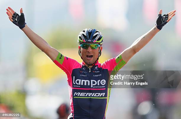 Diego Ulissi of Italy and Lampre-Merida celebrates crossing the finish line to win the fifth stage of the 2014 Giro d'Italia, a 203km medium mountain...