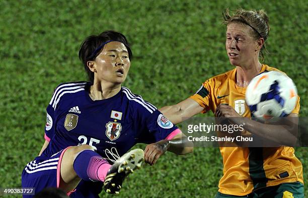 Michi Goto of Japan clashes with Elise Kellond-Knight of Australia during the AFC Women's Asian Cup Group A match between Australia and Japan at...