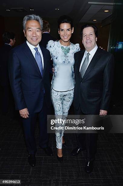 Kevin Tsujihara, Angie Harmon and Peter Roth attend the TBS / TNT Upfront 2014 at The Theater at Madison Square Garden on May 14, 2014 in New York...