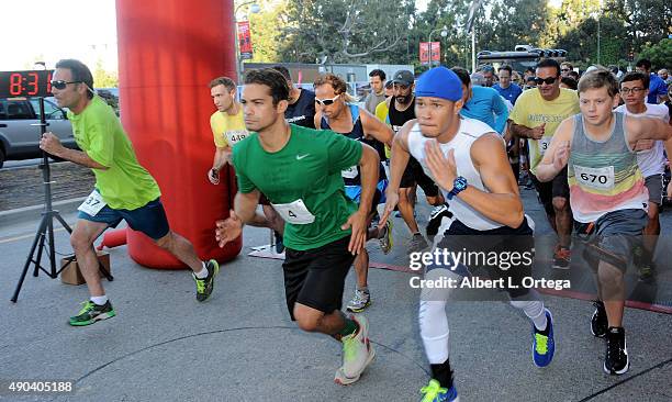 Actors/martial artists Hector David Jr. And Najee DeTiege of "Power Ragers Samurai" participates in GLA ALA's 8th Annual Justice Jog to benefit Casa...