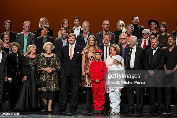 King Willem-Alexander of The Netherlands and Queen Maxima of The Netherlands pose with artists who participated in festivities marking the final...