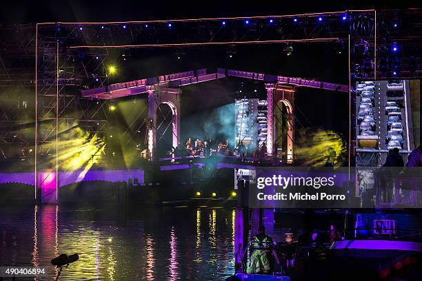 Folk band Rowwen Heze performs against a backdrop showing traffic congestion during festivities marking the final celebrations of 200 years Kingdom...