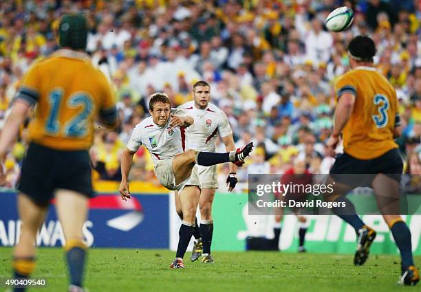 Jonny Wilkinson kicks the winning drop goal to give England victory in extra time during the Rugby World Cup Final between Australia and England held...