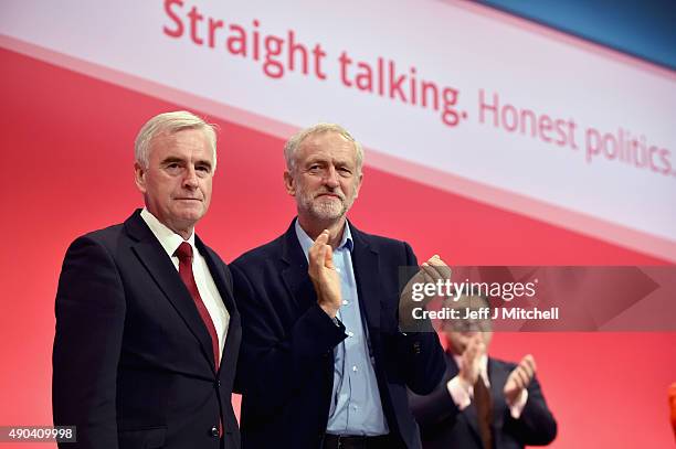 Shadow chancellor John McDonnell and Jeremy Corbyn take applause after addressing the Labour Party autumn conference on September 28, 2015 in...