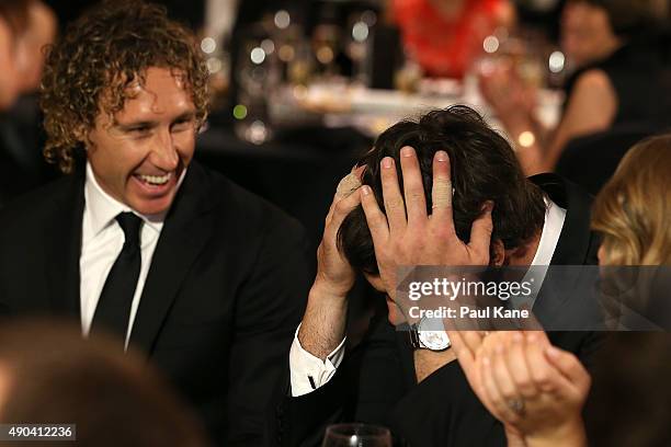 Josh Kennedy reacts after taking votes off Matt Priddis during the 2015 Brownlow Medal Function at Crown Perth on September 28, 2015 in Perth,...