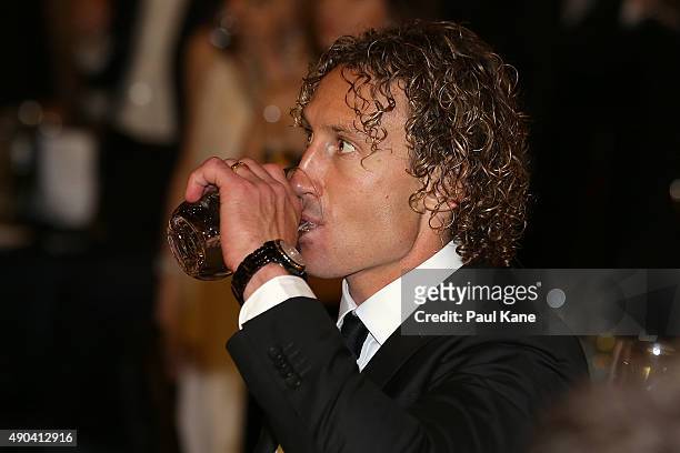 Matt Priddis toasts Nathan Fyfe of Fremantle on winning the Brownlow medal during the 2015 Brownlow Medal Function at Crown Perth on September 28,...
