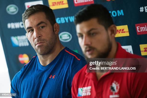 Canada's lock Jamie Cudmore looks at Canada's hooker Benoit Piffero during a press during a press conference in Leicester on September 28 during the...