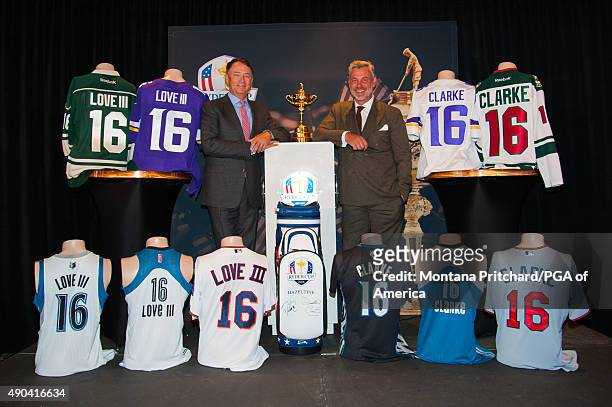 United States Captain, Davis Love III and European Captain, Darren Clarke pose with Minnesota professional sports team jerseys at the Welcome To...
