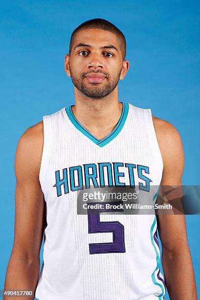 Nicolas Batum of the Charlotte Hornets poses for media day at the Time Warner Cable Arena on February 4, 2015 in Charlotte, North Carolina. NOTE TO...