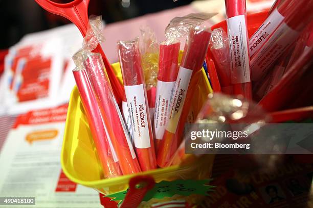 Sticks of rock for sale sit in a bucket on a stall at the Labour Party's annual conference in Brighton, U.K., on Monday, Sept. 28, 2015. U.K. Labour...
