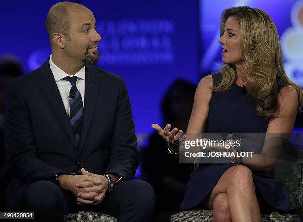 West Elm President Jim Brett listens as Box Founder and Senior Vice President of Industry Karen Appleton speaks during the Clinton Global Initiative...