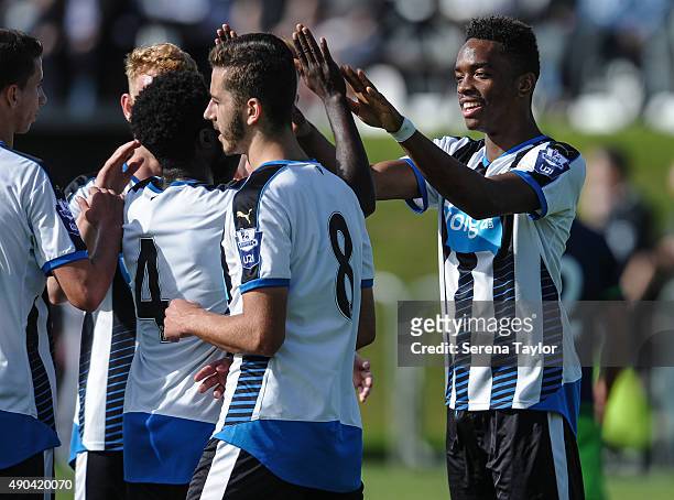Newcastle teammates congratulate Ivan Tony after scoring the opening goal during The under 21 Premier League match between Newcastle United and...