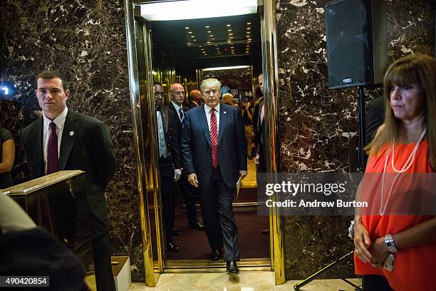 Republican presidential hopeful Donald Trump arrives to give a speech outlining his vision for tax reform at his skyscraper on Fifth Avenue on...