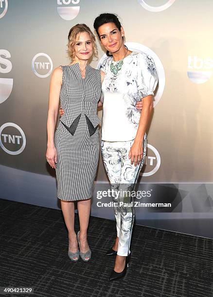 Kyra Sedgwick and Angie Harmon attend the 2014 TNT/TBS Upfront at The Theater at Madison Square Garden on May 14, 2014 in New York City.