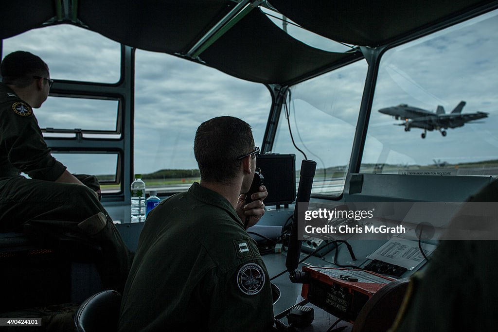 U.S. Navy Conduct Field Carrier Landing Practice In Iwo Jima