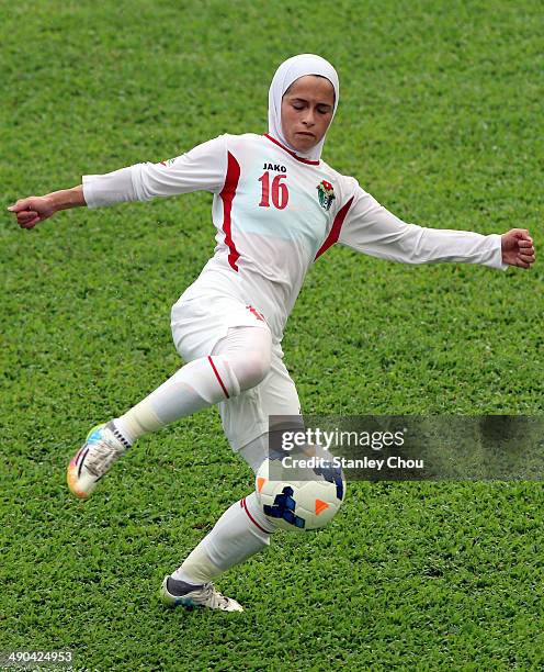 Shahnaz Yaseen of Jordan in action during the AFC Women's Asian Cup Group A match between Vietnam and Jordan at Thong Nhat Stadium on May 14, 2014 in...