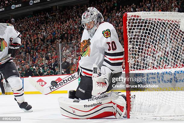 Corey Crawford of the Chicago Blackhawks makes a save against the Minnesota Wild during Game Four of the Second Round of the 2014 Stanley Cup...