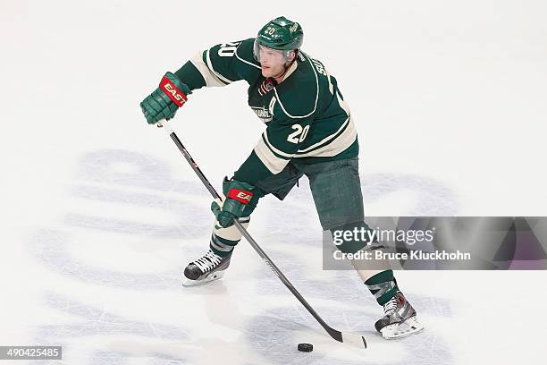 Ryan Suter of the Minnesota Wild handles the puck against the Chicago Blackhawks during Game Four of the Second Round of the 2014 Stanley Cup...