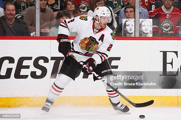 Duncan Keith of the Chicago Blackhawks handles the puck against the Minnesota Wild during Game Four of the Second Round of the 2014 Stanley Cup...