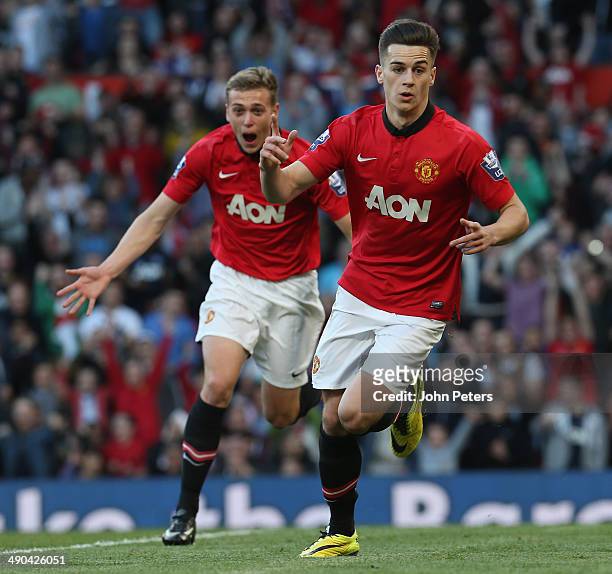 Tom Lawrence of Manchester United U21s celebrates scoring their first goal during the Barclays U21 Premier League final match between Manchester...