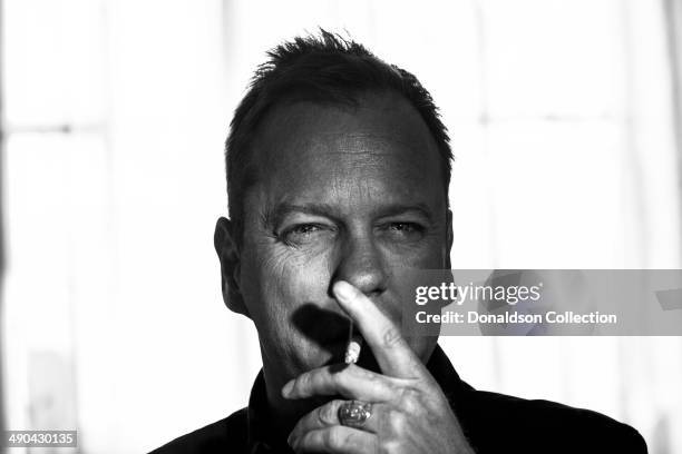 Actor Kiefer Sutherland poses for a portrait session on March 20, 2014 in Los Angeles, California.