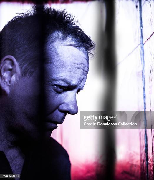 Actor Kiefer Sutherland poses for a portrait session on March 20, 2014 in Los Angeles, California.
