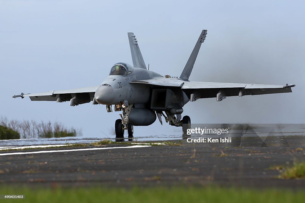 U.S. Navy Conduct Field Carrier Landing Practice In Iwo Jima