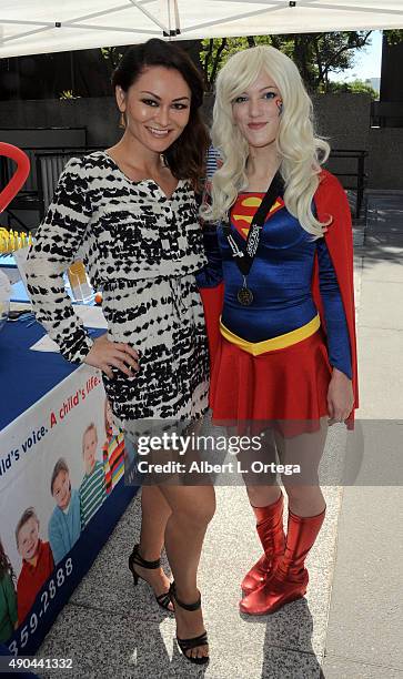 Actress Mary Christina Brown with cosplayer Jessie Prisemore as Supergirl participate in GLA ALA's 8th Annual Justice Jog to benefit Casa LA on...