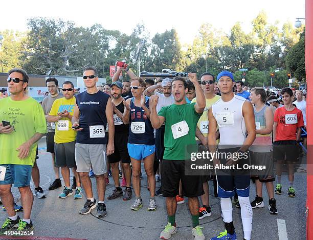 Actors/martial artists Hector David Jr. And Najee DeTiege of "Power Ragers Samurai" participates in GLA ALA's 8th Annual Justice Jog to benefit Casa...