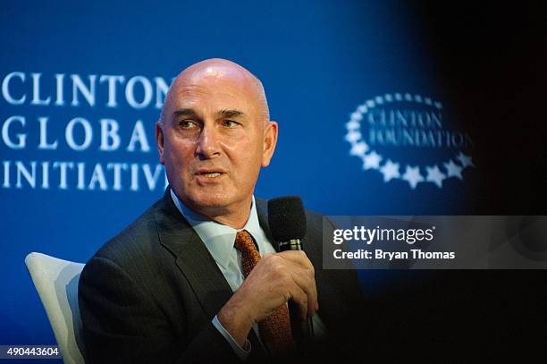 Monsanto's Chairman and CEO Hugh Grant speaks to an audience during the Clinton Global Initiative Annual Meeting at the Sheraton Hotel and Towers on...