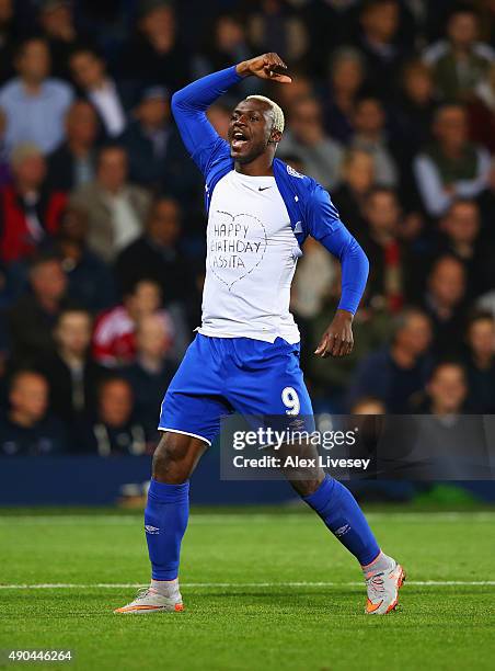 Arouna Kone of Everton celebrates as he scores their second and equalising goal during the Barclays Premier League match between West Bromwich Albion...