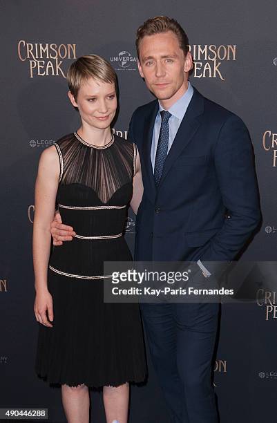 Mia Wasikowska and Tom Hiddleston attend the 'Crimson Peak' Paris Premiere at UGC Cine Cite Bercy on September 28, 2015 in Paris, France.