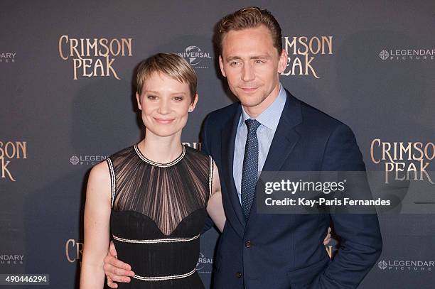 Mia Wasikowska and Tom Hiddleston attend the 'Crimson Peak' Paris Premiere at UGC Cine Cite Bercy on September 28, 2015 in Paris, France.