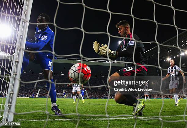 Romelu Lukaku of Everton beats goalkeeper Boaz Myhill of West Bromwich Albion as he scores their third goal during the Barclays Premier League match...