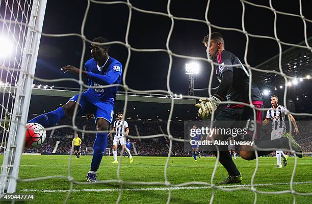 Romelu Lukaku of Everton beats goalkeeper Boaz Myhill of West Bromwich Albion as he scores their third goal during the Barclays Premier League match...