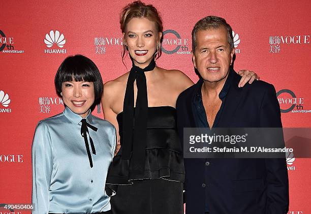 Angelica Cheung, Karlie Kloss and Mario Testino attend Vogue China 10th Anniversary at Palazzo Reale on September 28, 2015 in Milan, Italy.