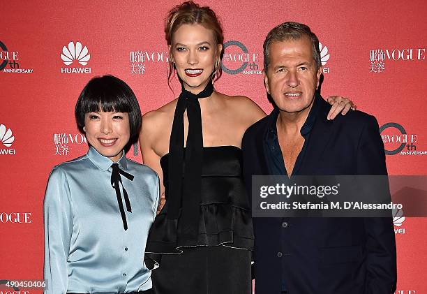 Angelica Cheung, Karlie Kloss and Mario Testino attend Vogue China 10th Anniversary at Palazzo Reale on September 28, 2015 in Milan, Italy.