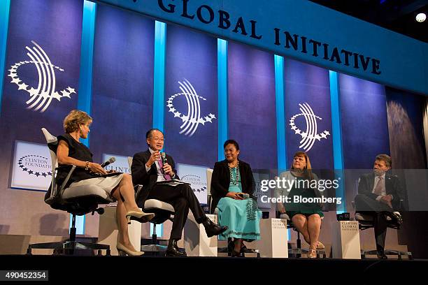 Jim Yong Kim, president of the World Bank Group, second left, speaks on a panel with Judith Rodin, president of The Rockefeller Foundation, left,...